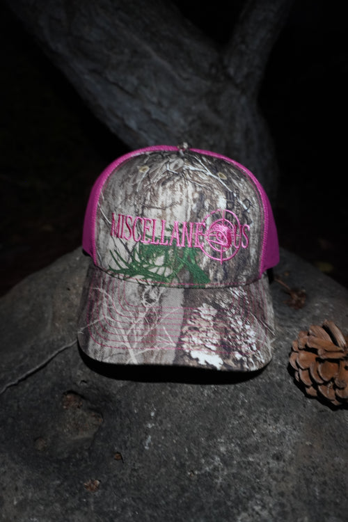 Realtree Edge camo trucker hat with neon pink mesh and pink embroidered Miscellaneous logo