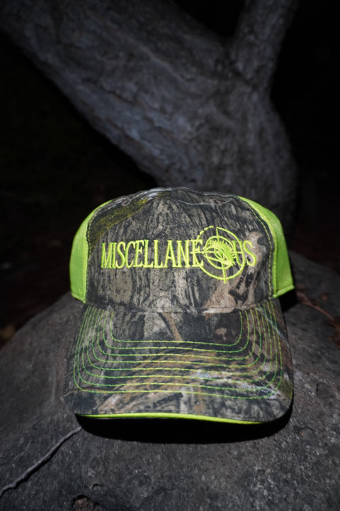 Realtree camo trucker hat with neon yellow mesh and neon yellow embroidered Miscellaneous logo