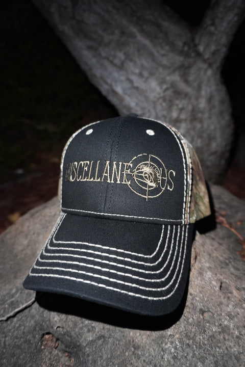 Black and Realtree AP camo hat with stone-stitched brim and embroidered Miscellaneous logo
