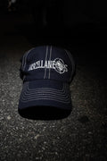 Navy dad hat with stone contrast stitching and white embroidered Miscellaneous logo